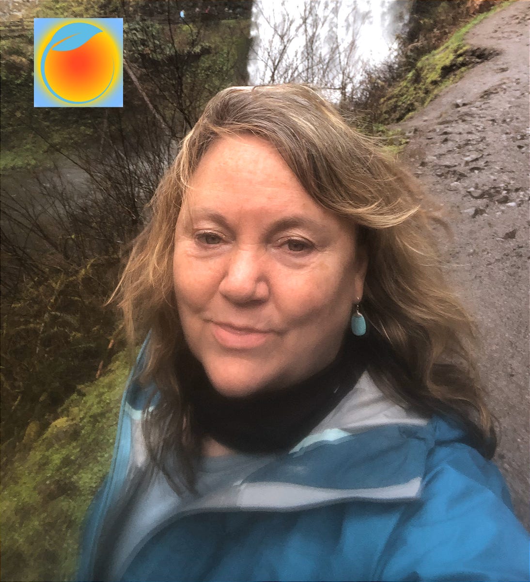 Photo of woman in front of waterfalls