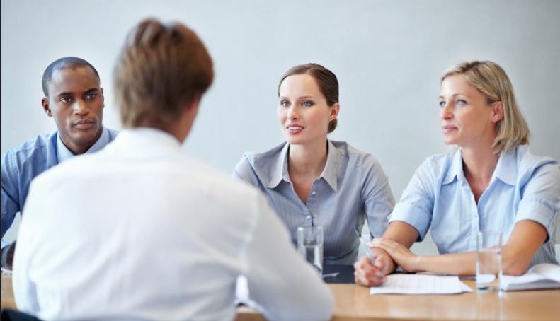 A high-stakes interview for a Senior Data Engineer/Architect role in a large, matrix-structured financial services organization.