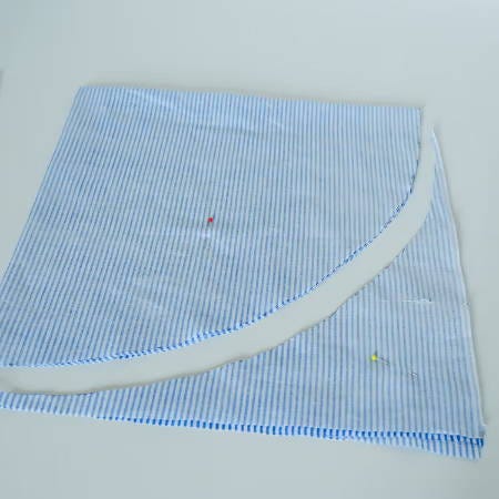 a circle cut from a square piece of cotton fabric a circle cut from a square piece of cotton fabric