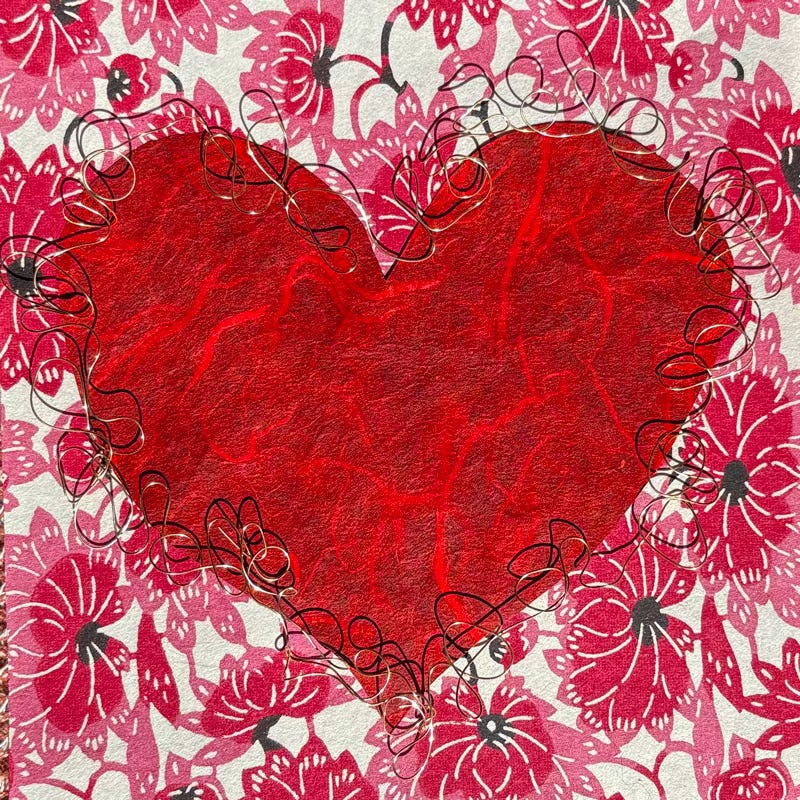 A paper collage of a heart behind wire