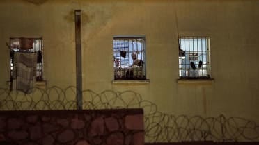 Prisoners are seen from a window at the Korydallos prison in Athens, the largest penitentiary in Greece, on May 3, 2015. (File photo: AFP)