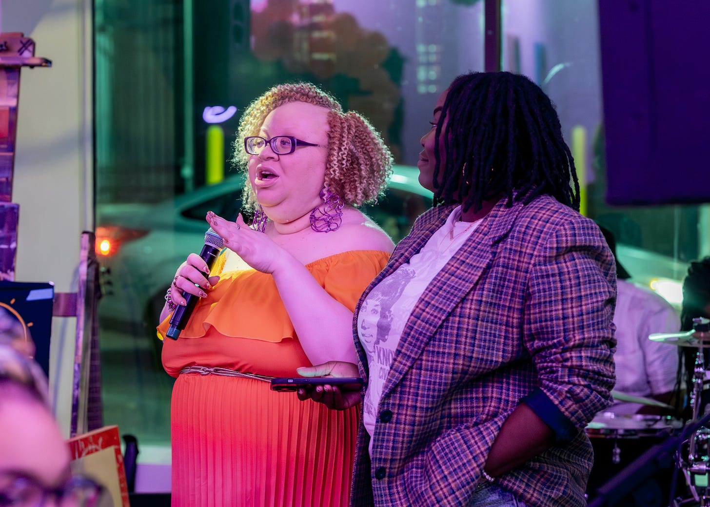 Sara A. Crawford speaks into a microphone during Blondie Mansion Week-End. Sara A. Crawford speaks into a microphone during Blondie Mansion Week-End.
