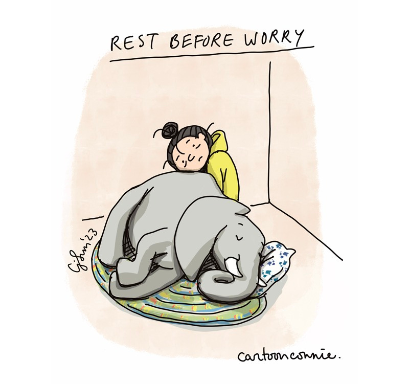 Art description: Excerpt from a 2-panel illustration of an elephant napping and a girl with a bun seeking comfort and reassurance that things will be okay. Titled "Rest Before Worry" by Connie Sun, cartoonconnie, 2023.