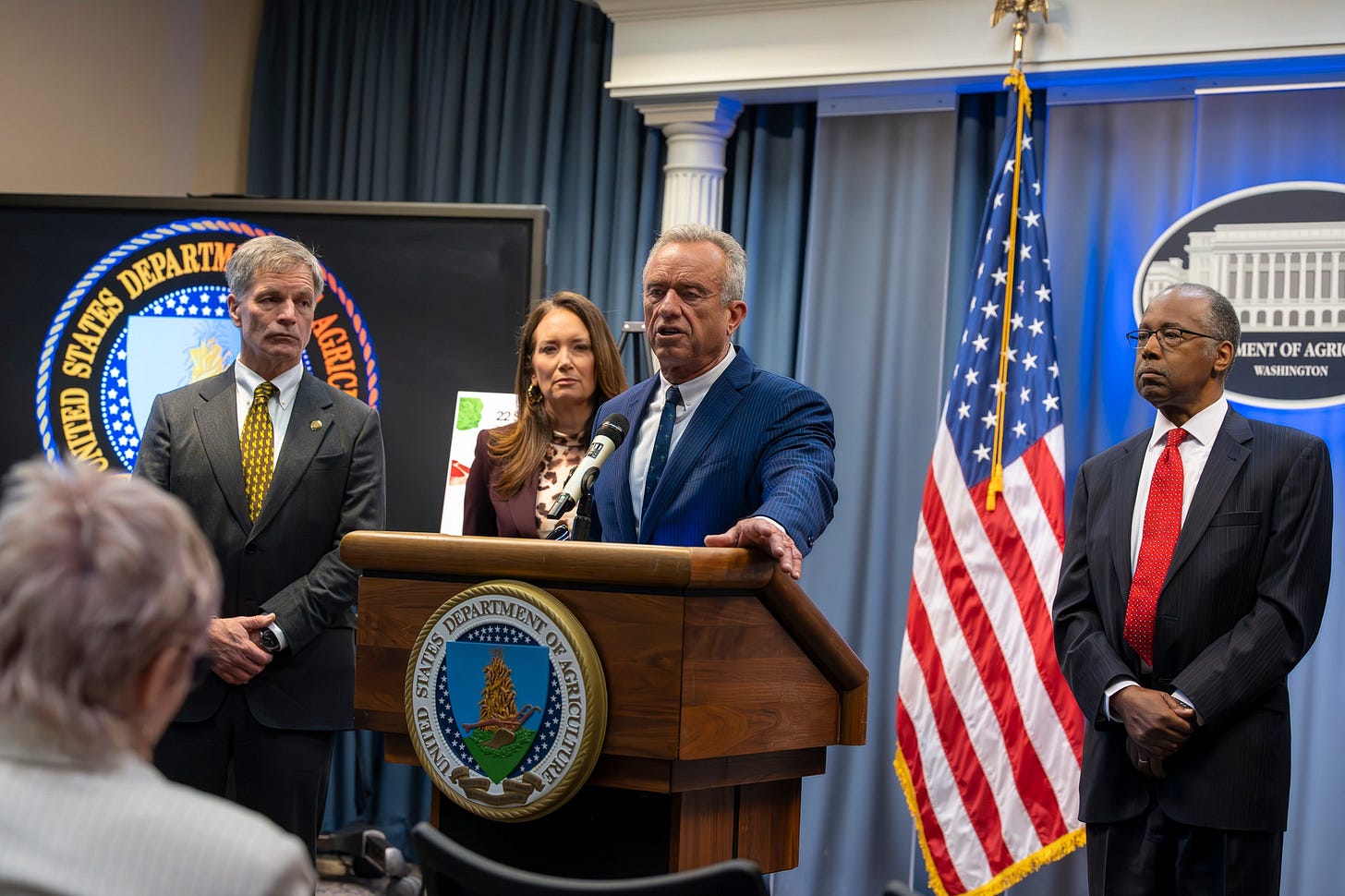 May be an image of the Oval Office, dais and text