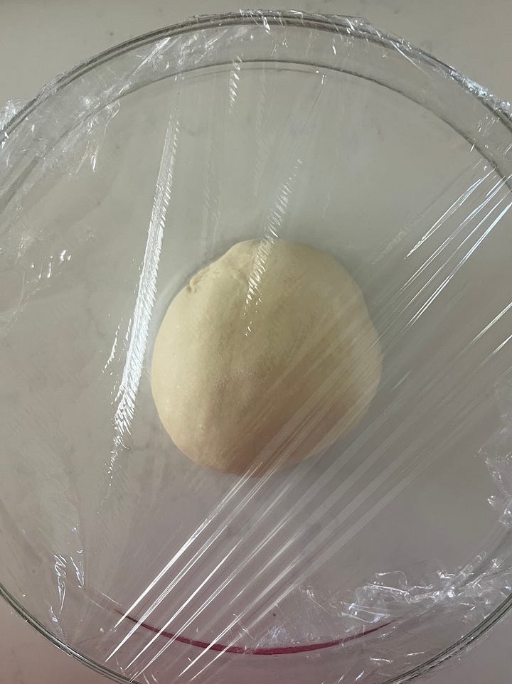 Two photos: one of the initial dough pre-rise and the second after the first rise where it's doubled in size