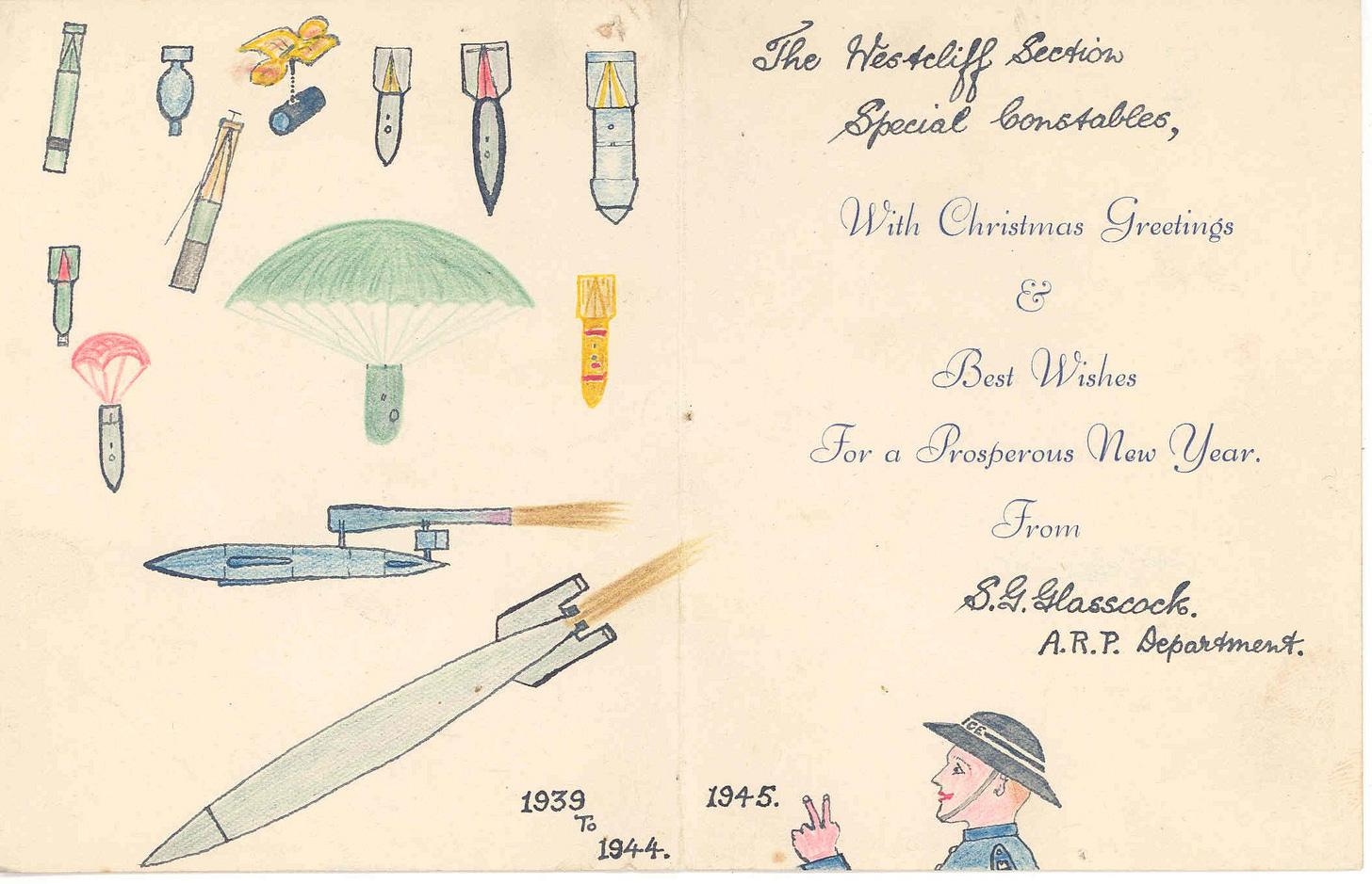 The inside of a christmas card featuring colour pencil illustrations of various bombs and rockets, some on parachutes. At the bottom 1939 to 1945 is written next to another illustration of a police officer throwing the victory sign.