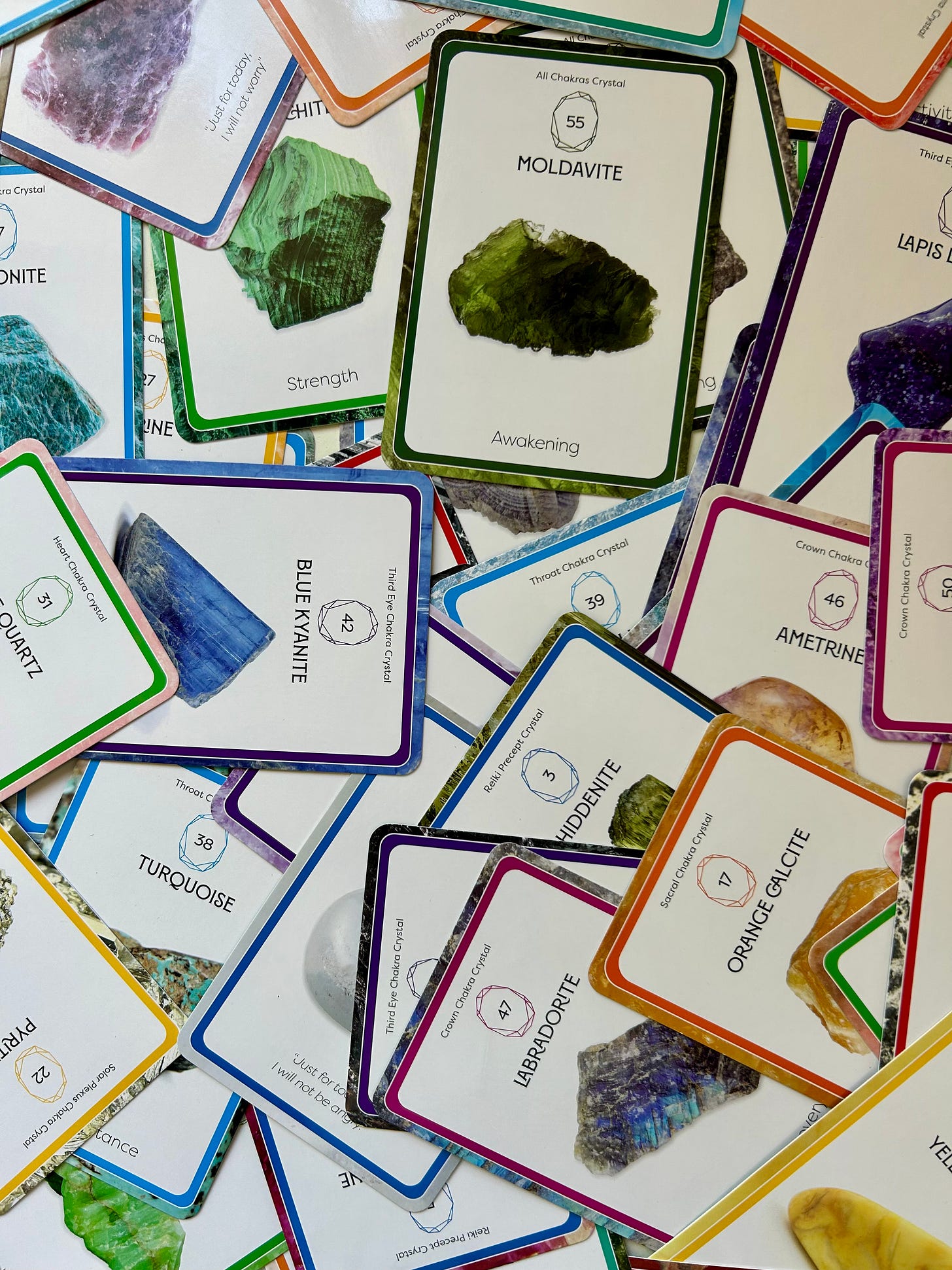 Raise Your Vibes Crystal Cards by Athena Bahri.