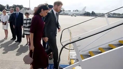 Image result for meghan anD HARRY plane touch down birmingham 26 august