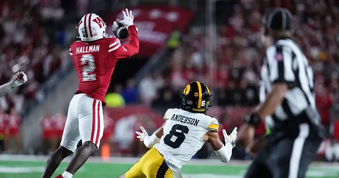 Wisconsin Badgers cornerback Ricardo Hallman (2) deflects a pass against the Iowa Hawkeyes at Camp Randall Stadium.