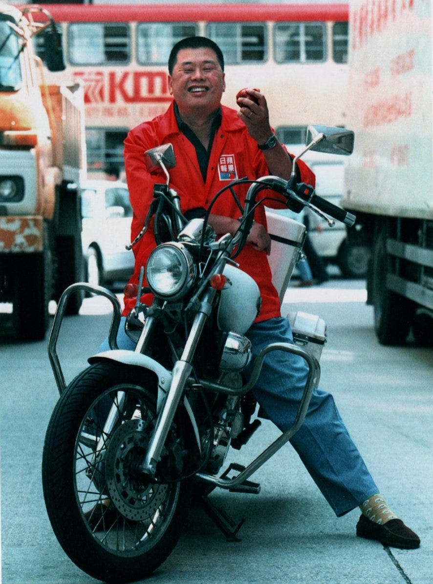 Jimmy Lai, Apple Daily proprietor, on a motorcycle.