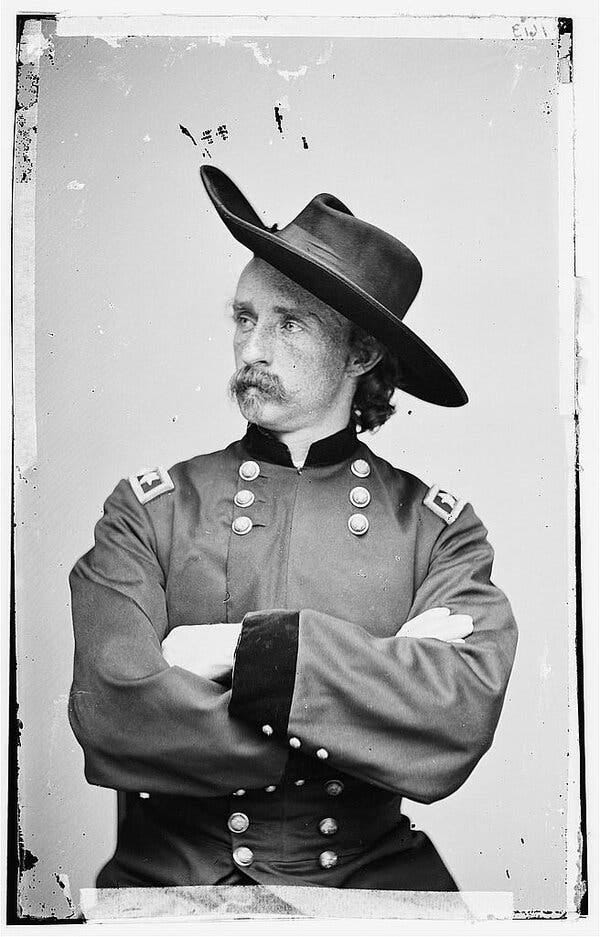 A man in uniform poses for a formal portrait. A man in uniform poses for a formal portrait.