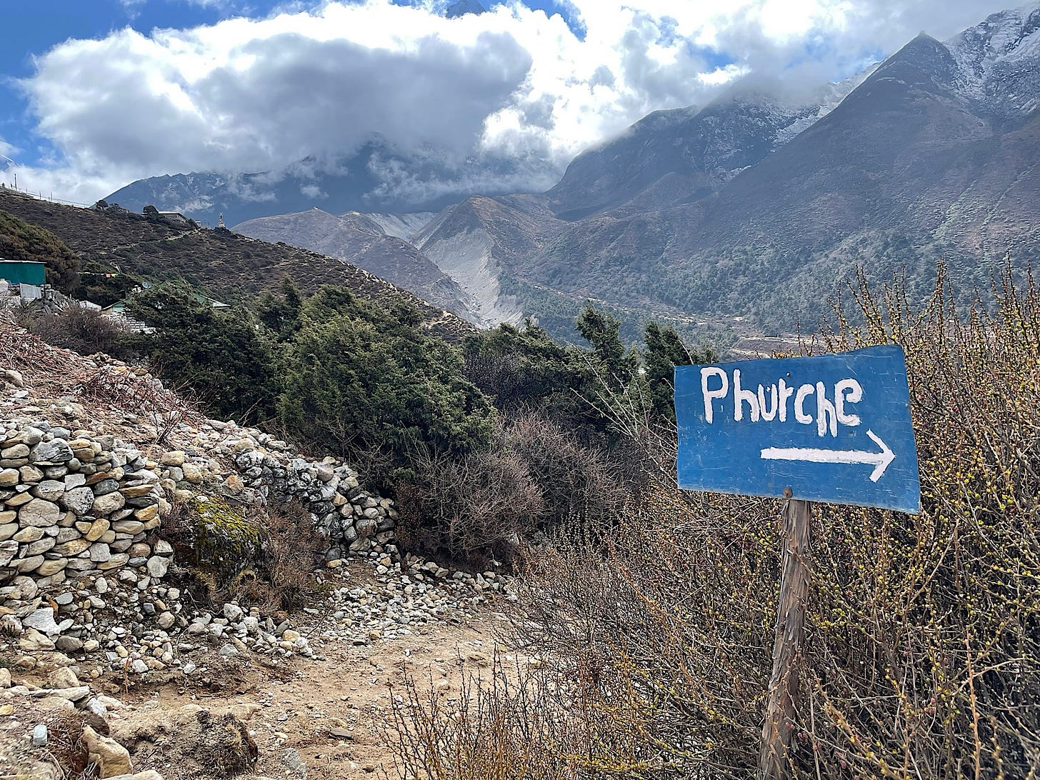 A sign pointing the way to Phortse, spelled etymologically.
