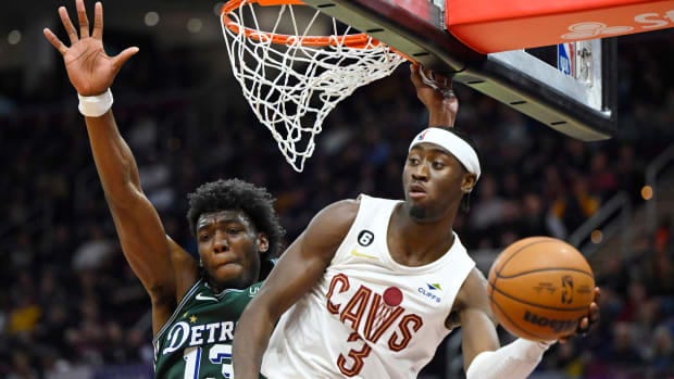 Mar 4, 2023; Cleveland, Ohio, USA; Cleveland Cavaliers guard Caris LeVert (3) passes beside Detroit Pistons guard James Wiseman (13) in the third quarter at Rocket Mortgage FieldHouse. Mandatory Credit: David Richard-USA TODAY Sports Mar 4, 2023; Cleveland, Ohio, USA; Cleveland Cavaliers guard Caris LeVert (3) passes beside Detroit Pistons guard James Wiseman (13) in the third quarter at Rocket Mortgage FieldHouse. Mandatory Credit: David Richard-USA TODAY Sports