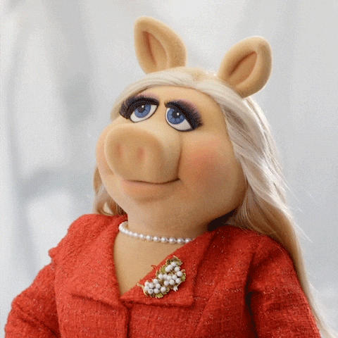 a GIF of Miss Piggy