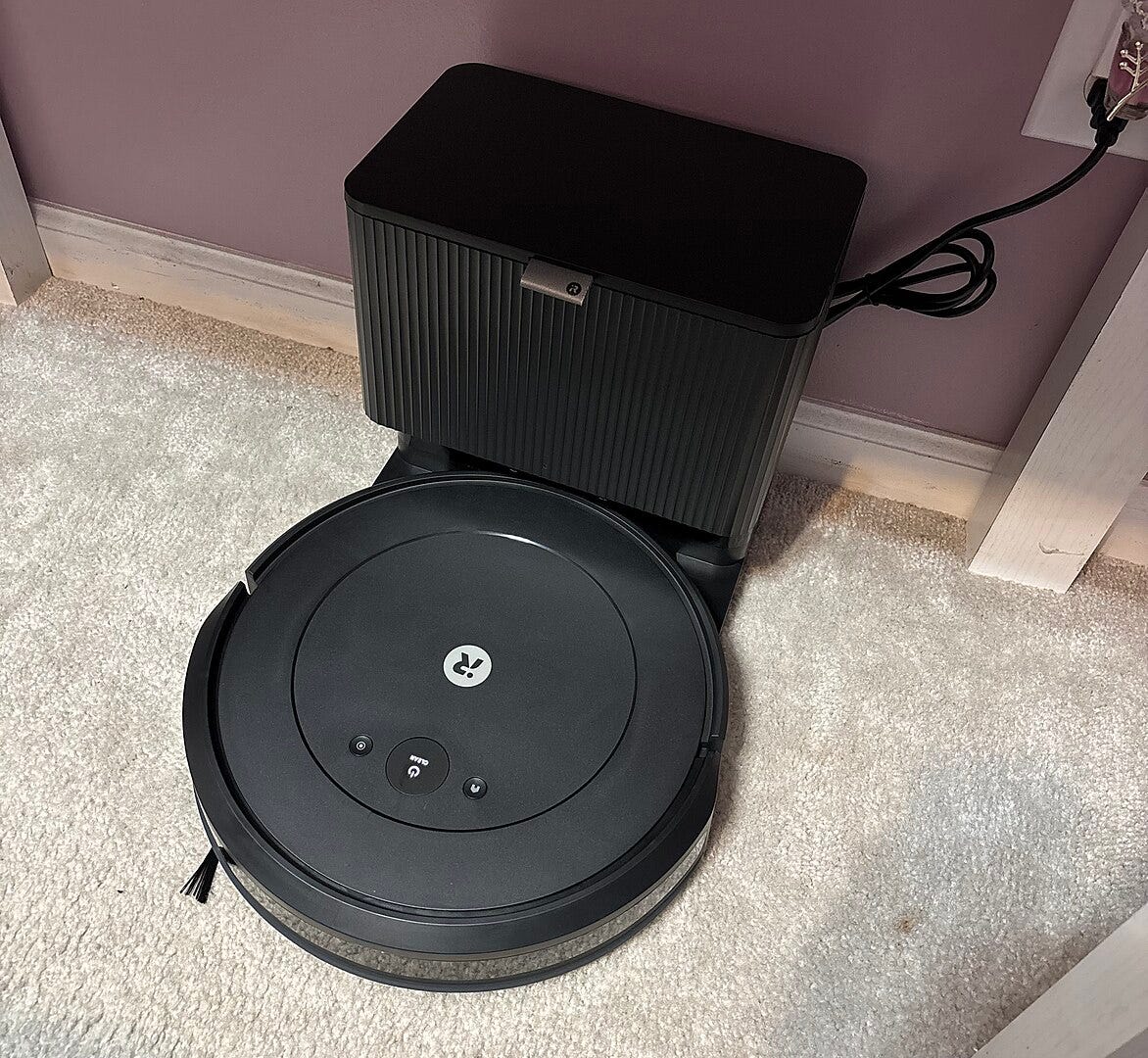 a Roomba on charge