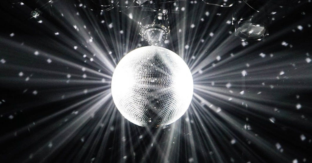 grayscale photography of disco ball