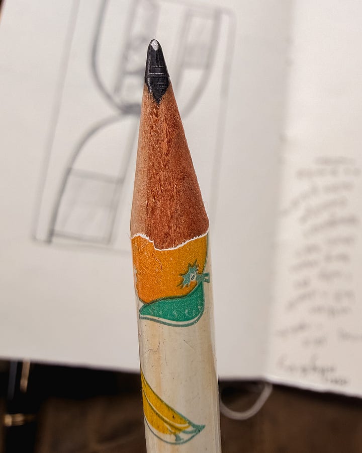 self portrait and pencil