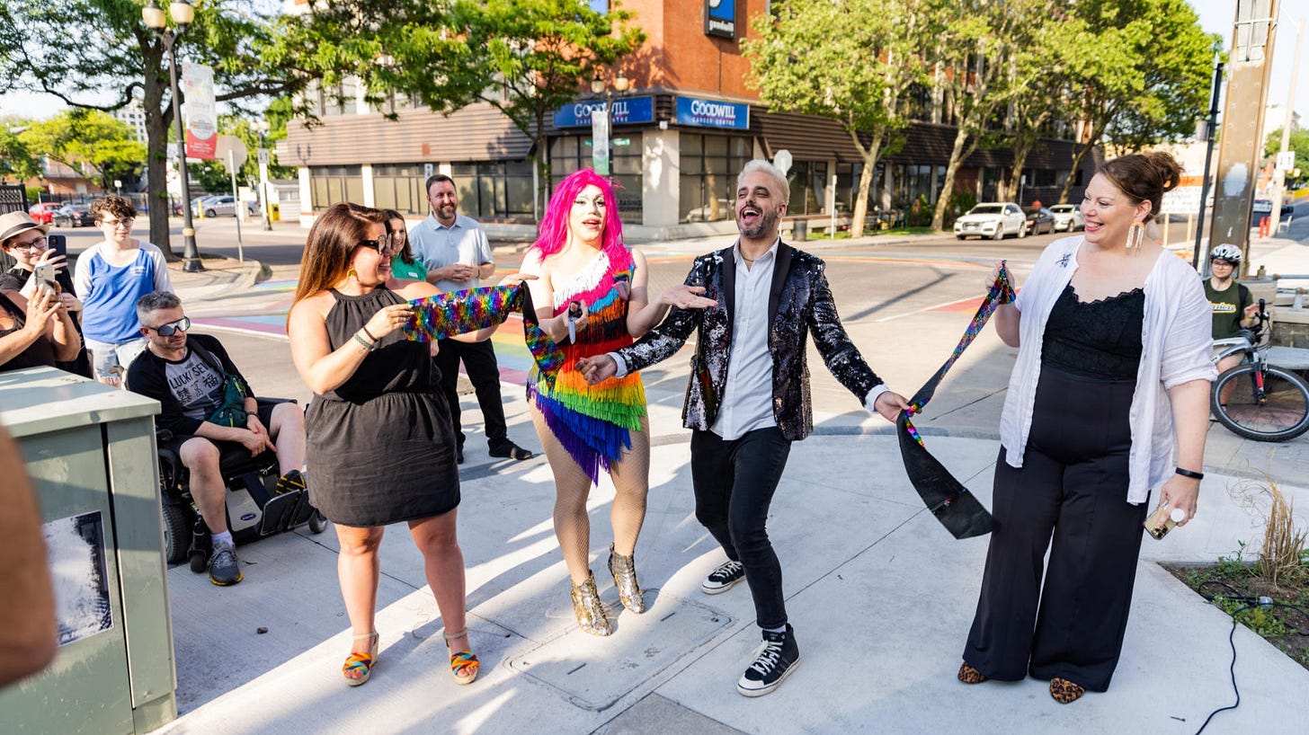 Ribbon cutting for the new Pride crosswalks in the International Village BIA - Community Grants funding supported this event Ribbon cutting for the new Pride crosswalks in the International Village BIA - Community Grants funding supported this event
