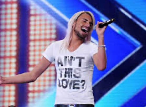 A person singing into a microphone