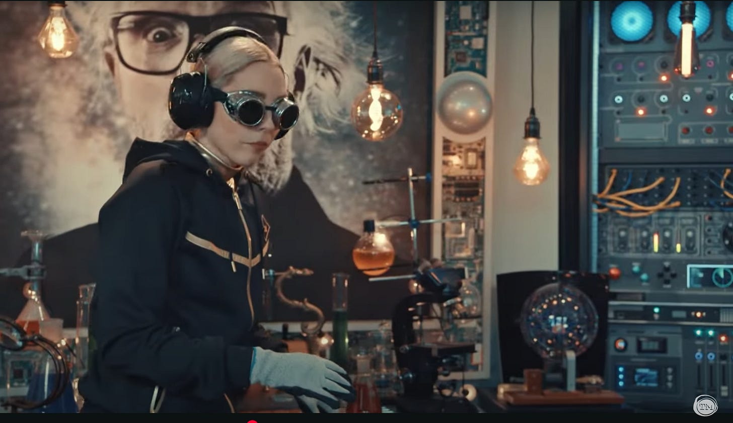 Stevie Martin wears black goggles, gloves, and noise-canceling headphones.