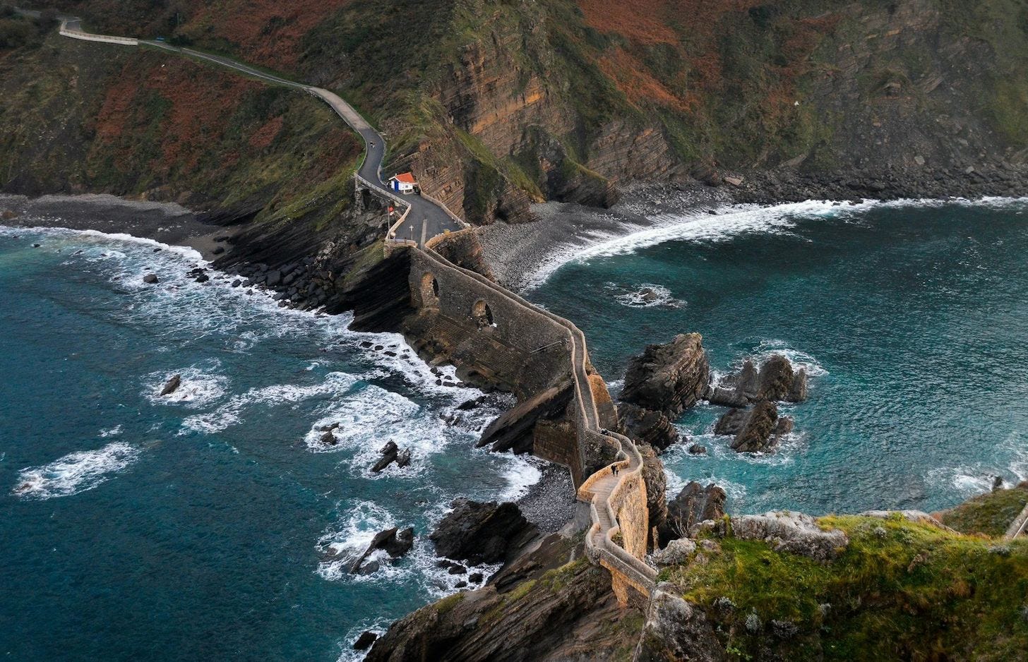 Coastal views along the Camino del Norte overlooking cliffs and the Cantabrian Sea in northern Spain. Coastal views along the Camino del Norte overlooking cliffs and the Cantabrian Sea in northern Spain.