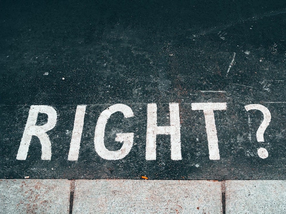 black and white stop road sign