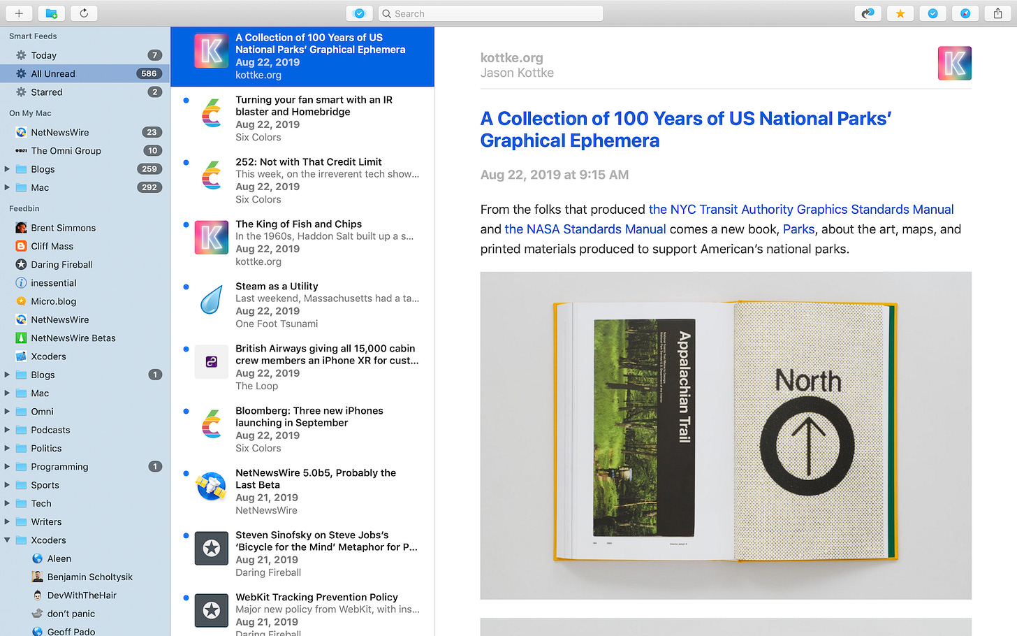 NetNewsWire window open with plenty of folders, a live feed with articles, and an article titled "A collection of 100 years of US national parks' geographical ephemera" open.