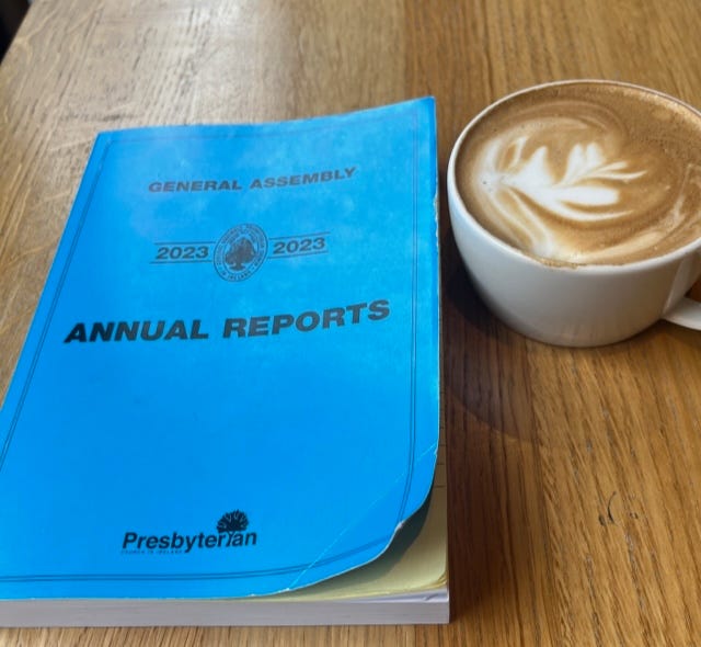 Image By Author - Blue Book and A Flat White