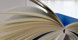 Self-Publishing Services: image of an open book.