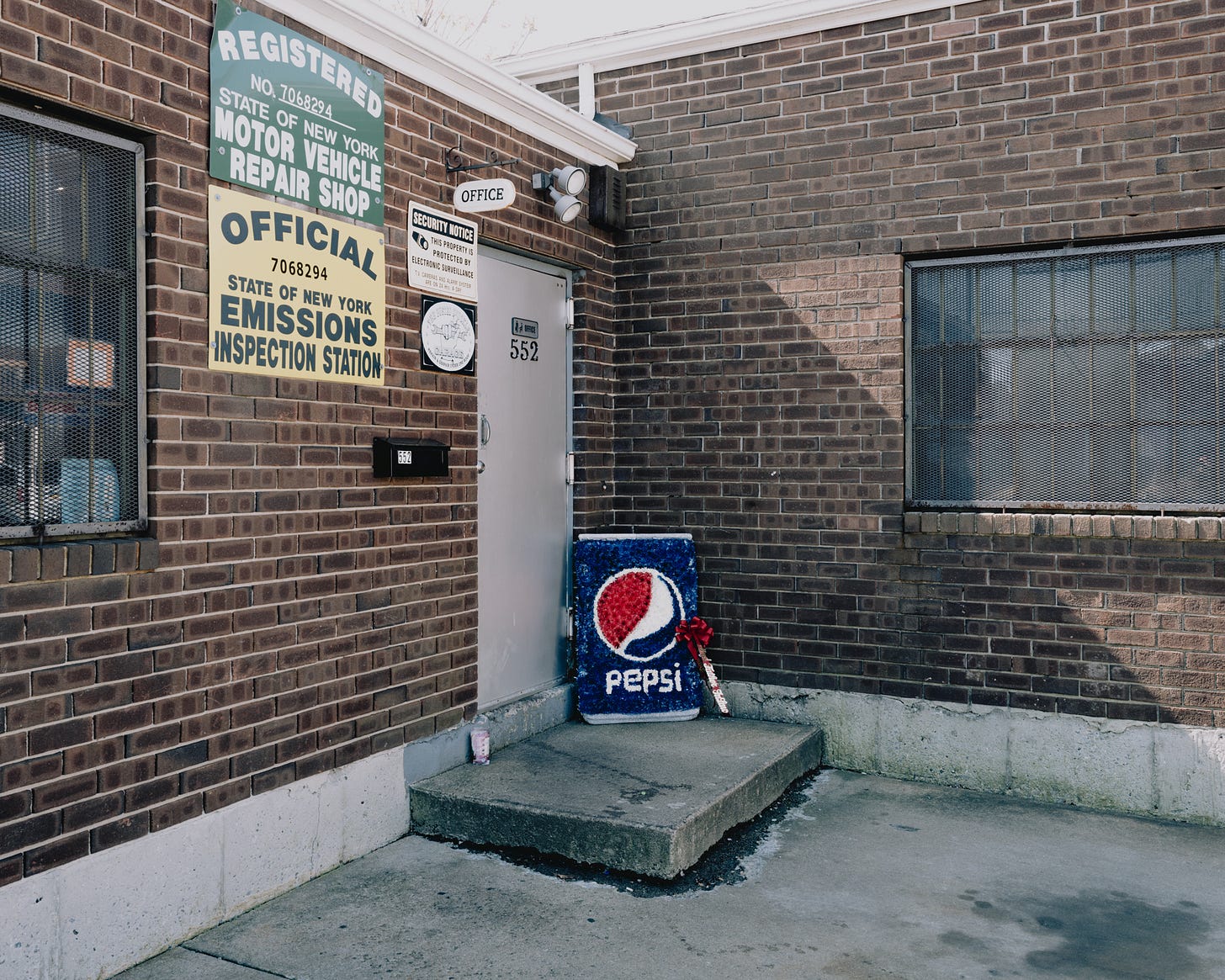 Hand-Made-Pepsi-Sign-Outside-Of-Brick-Building