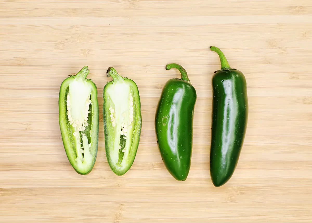 Jalapeño chiles on cutting board