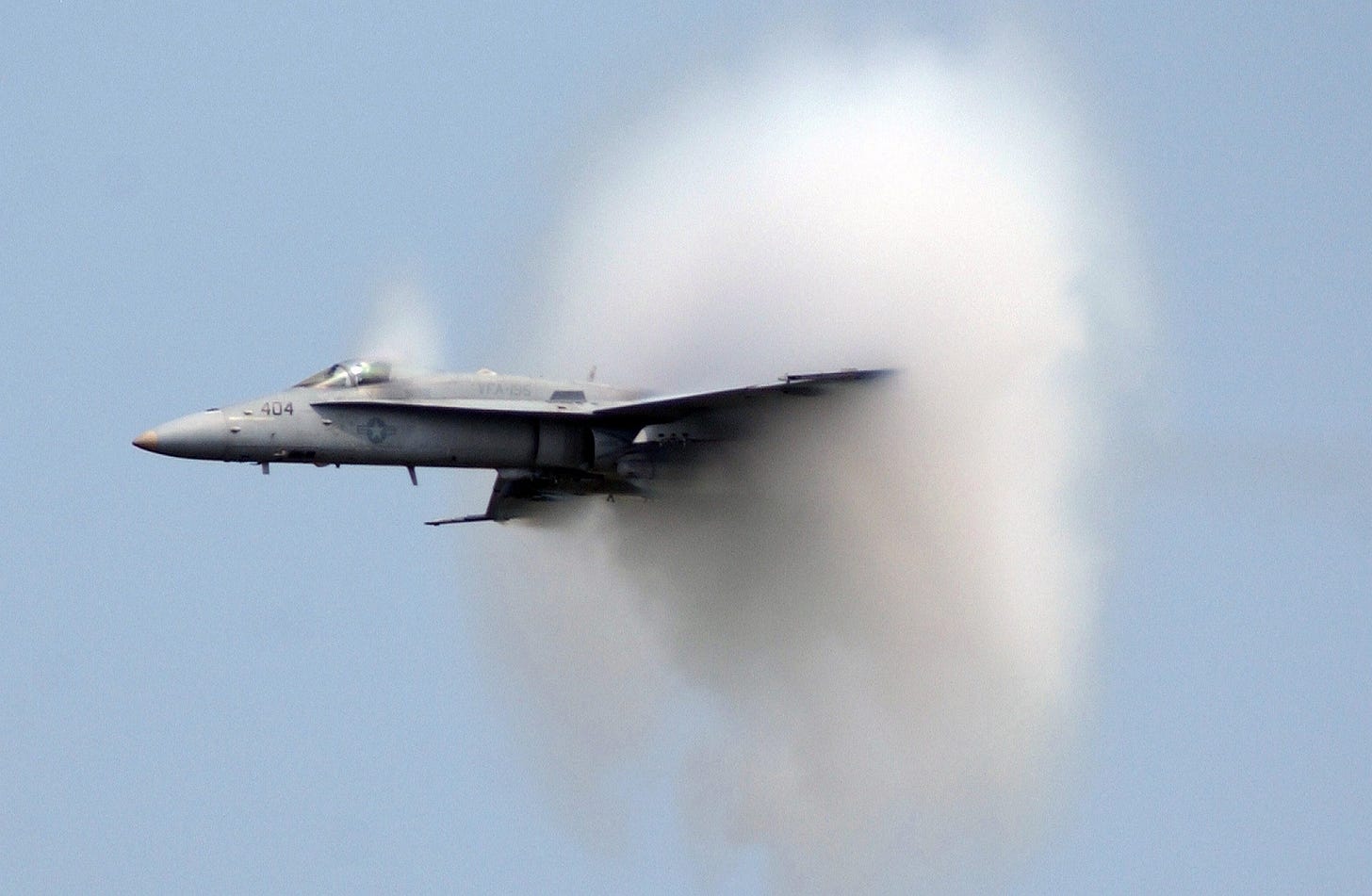 Fighter jet breaking the sound barrier