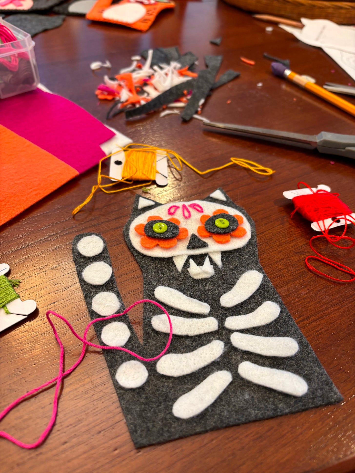 Image of felt skeleton cat halloween cat with embroidery thread