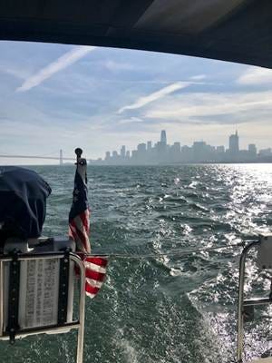 A flag on a boat

AI-generated content may be incorrect.