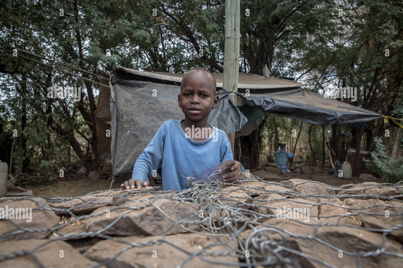 Black boy about six years old, portrait in Kakuma refugee camp.