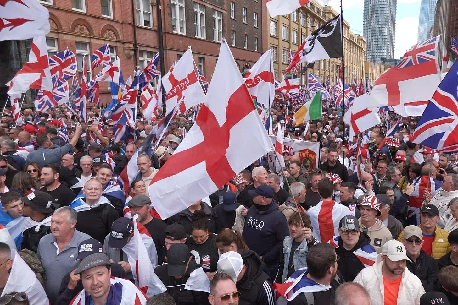 People flying Union and St George’s Cross flags during the Tommy Robinson-led Unite the Kingdom march and rally in London (Jamie Lashmar/PA) People flying Union and St George’s Cross flags during the Tommy Robinson-led Unite the Kingdom march and rally in London (Jamie Lashmar/PA)