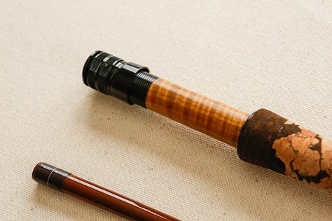 A custom 4wt fiberglass fishing rod with styling inspired by a 1970s Ford Bronco.