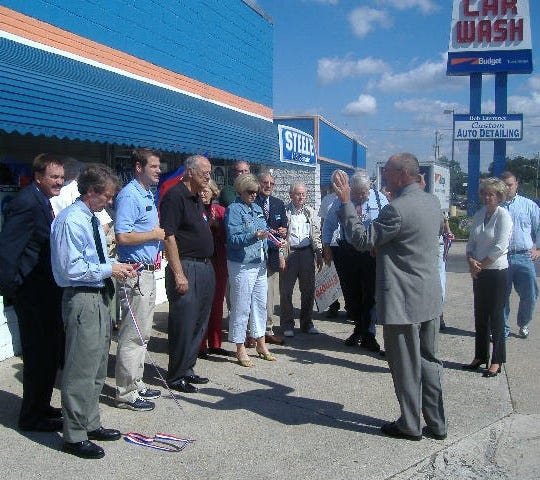 A number of local politicians were present to cut the ribbon. A number of local politicians were present to cut the ribbon.