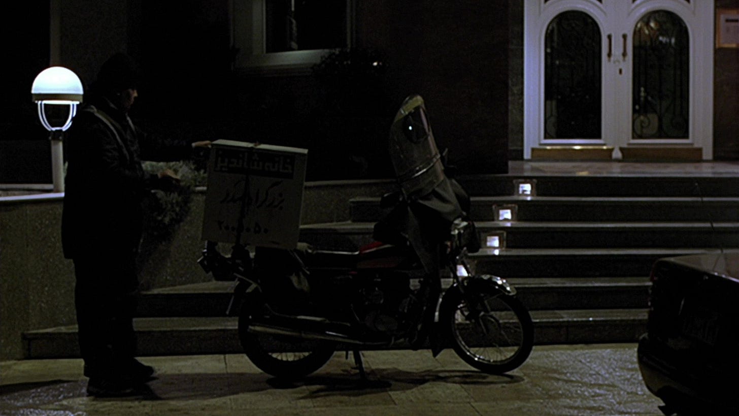 Crimson Gold | Still features a motorbike with pizza boxes to be delivered.