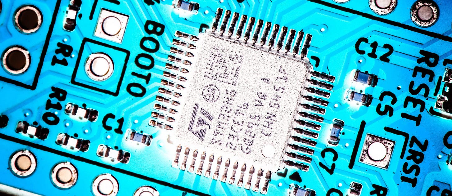 Manipulated close-up photograph of a computer chip — decorative image only.