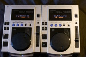 A pair of Pioneer CDJ-100s