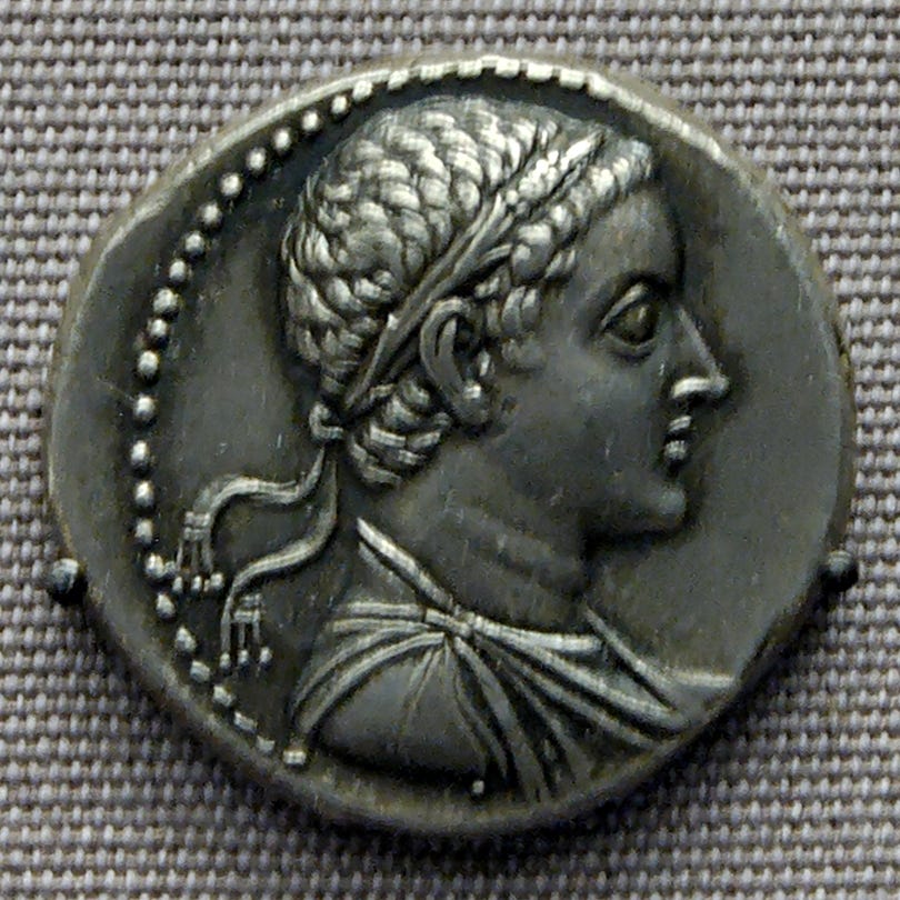 Ancient silver coin bearing the profile of Ptolemy V of Egypt. Ancient silver coin bearing the profile of Ptolemy V of Egypt.