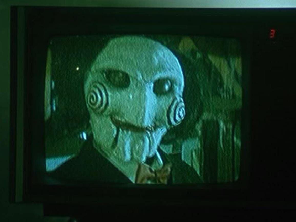 If the part of jigsaw where we see billy takes place BEFORE the first saw  movies, why is the quality so good on the screen? And also, does anybody  else feel like