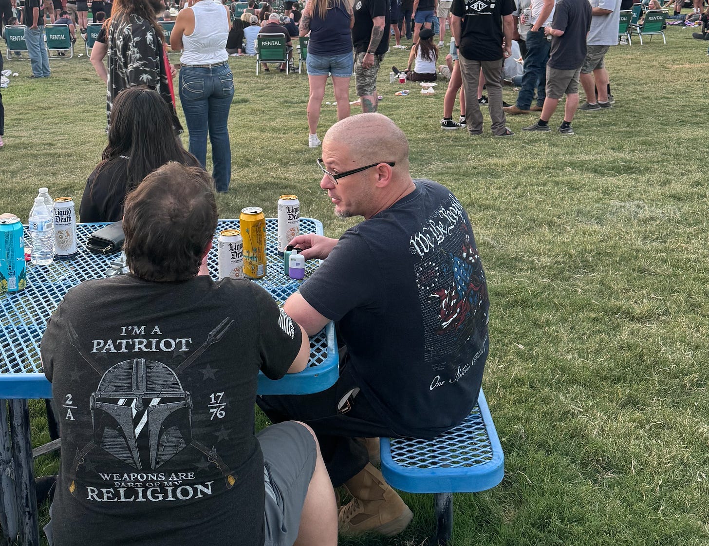 Two white men in Patriot tee shirts with 2A and 1776 on them