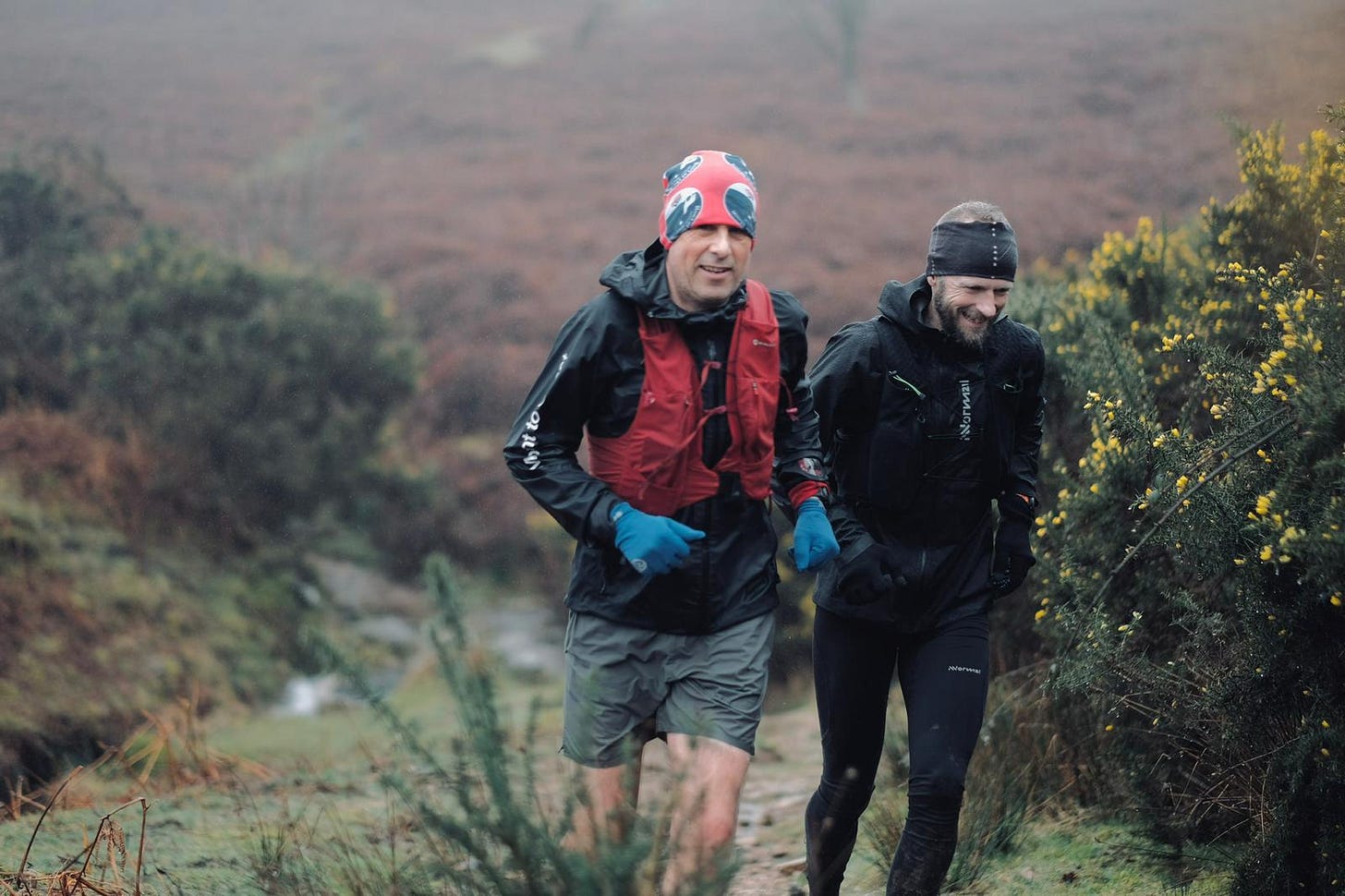 Adharanand Finn and Damian Hall running on Dartmoor