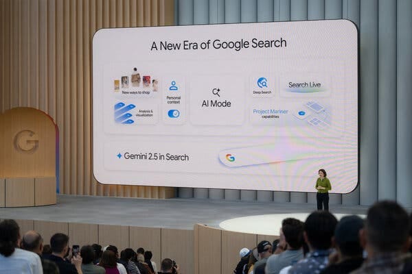 Liz Reid speaks from a stage with an enormous sign reading “A New Era of Google Search” behind her. Liz Reid speaks from a stage with an enormous sign reading “A New Era of Google Search” behind her.