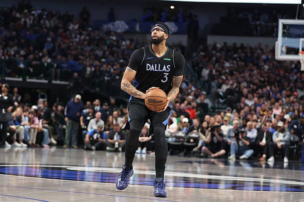 Anthony Davis of the Dallas Mavericks handles the ball during the game against the Houston Rockets on January 3, 2026 at American Airlines Center in...