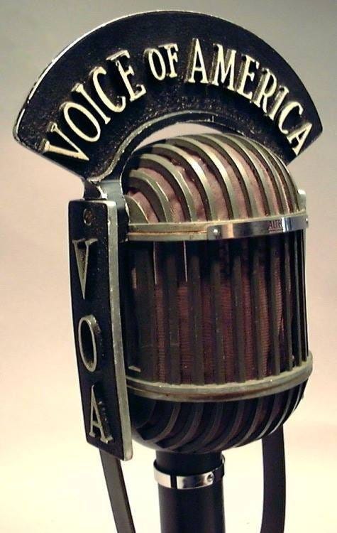 May be an image of text that says 'VOICE OF AMERICA EKCИ സര'