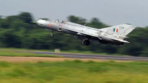 AFP via Getty Images An Indian Air Force (IAF) MIG-21 takes off during a drill for Air Force Day celebrations in Kalikunda IAF airbase around 170 km west of Kolkata on September 29, 2011