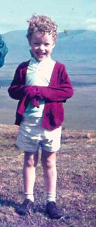 A photo of me at age four on a mountainside in Ireland.